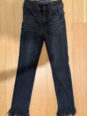 American Eagle black skinny jeans with frayed hems